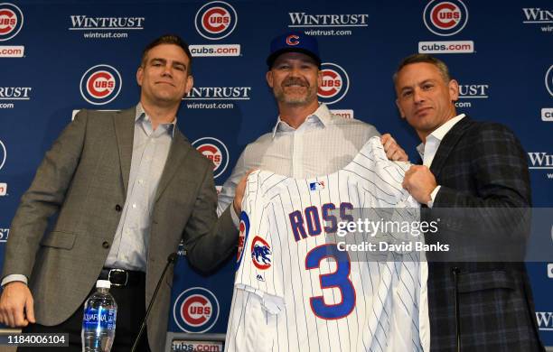 Theo Epstein, president of baseball operations of the Chicago Cubs, David Ross, new manager of the Chicago Cubs and Jed Hoyer, general manager of the...