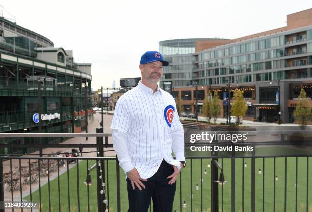David Ross, new manager of the Chicago Cubs, poses for photos after being introduced at a press conference at Wrigley Field on October 28, 2019 in...
