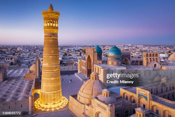 bukhara uzbekistan kalyan minaret and madressa sunset twilight - usbequistão imagens e fotografias de stock