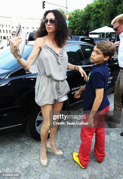 Boris Becker and wife Lilly with his son Elias Balthasar arrive at the Perret Schaad Show during Mercedes-Benz Fashion Week Berlin Spring/Summer 2012...