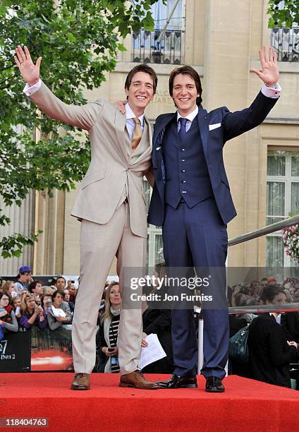 Actors Oliver Phelps and James Phelps attend the "Harry Potter And The Deathly Hallows Part 2" world premiere at Trafalgar Square on July 7, 2011 in...