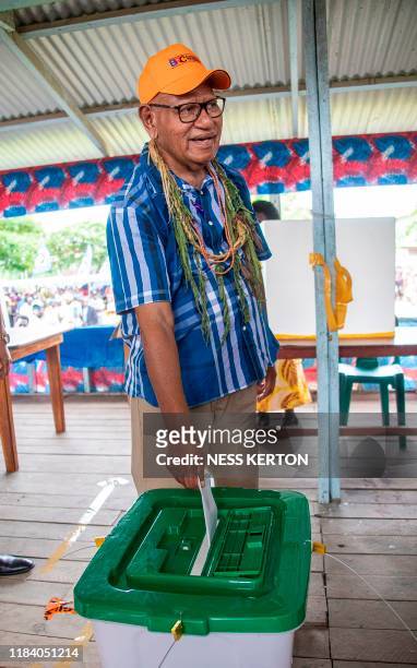 Bougainville regional president John Momis casts his ballot in an historical independence vote in Buka on November 23, 2019. - Voters in the Pacific...