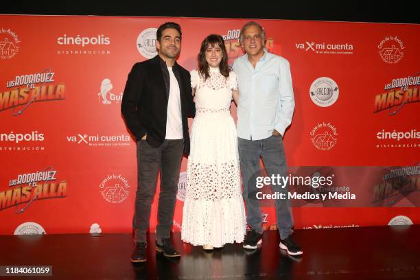 Omar Chaparro, Mariana Treviño and Paco Arango poses for photos during a press conference of 'Los Rodriguez Y Mas Alla' film at Cinepolis Diana on...