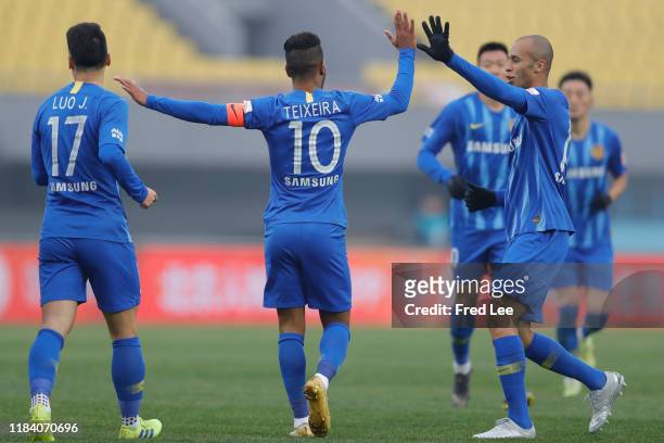 Alex Teixeira of Jiangsu Suningi celebrates after scoring his team's goal during the 2019 China Super League between Beijing Renhe and Jiangsu...