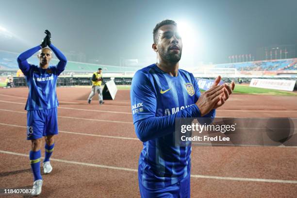 Alex Teixeira of Jiangsu Suning acknowledges the fans during the 2019 China Super League between Beijing Renhe and Jiangsu Sunning at Beijing Fengtai...