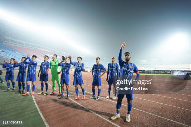 Alex Teixeira of Jiangsu Suning acknowledges the fans during the 2019 China Super League between Beijing Renhe and Jiangsu Sunning at Beijing Fengtai...