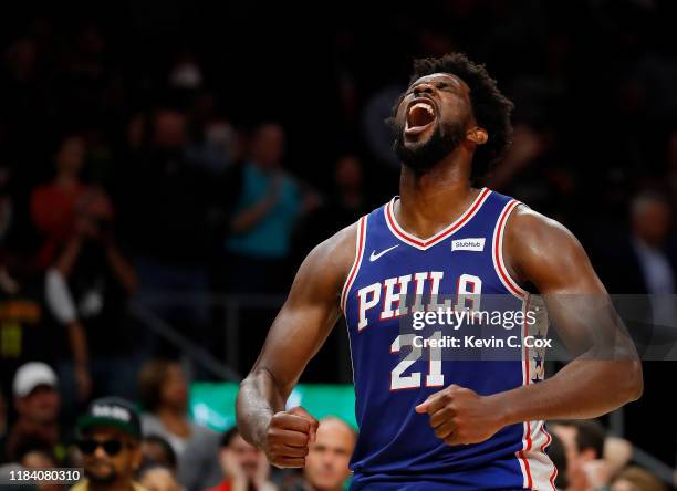 Joel Embiid of the Philadelphia 76ers reacts after their 105-103 win over the Atlanta Hawks at State Farm Arena on October 28, 2019 in Atlanta,...