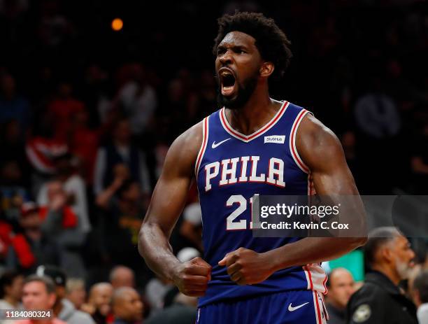 Joel Embiid of the Philadelphia 76ers reacts after their 105-103 win over the Atlanta Hawks at State Farm Arena on October 28, 2019 in Atlanta,...