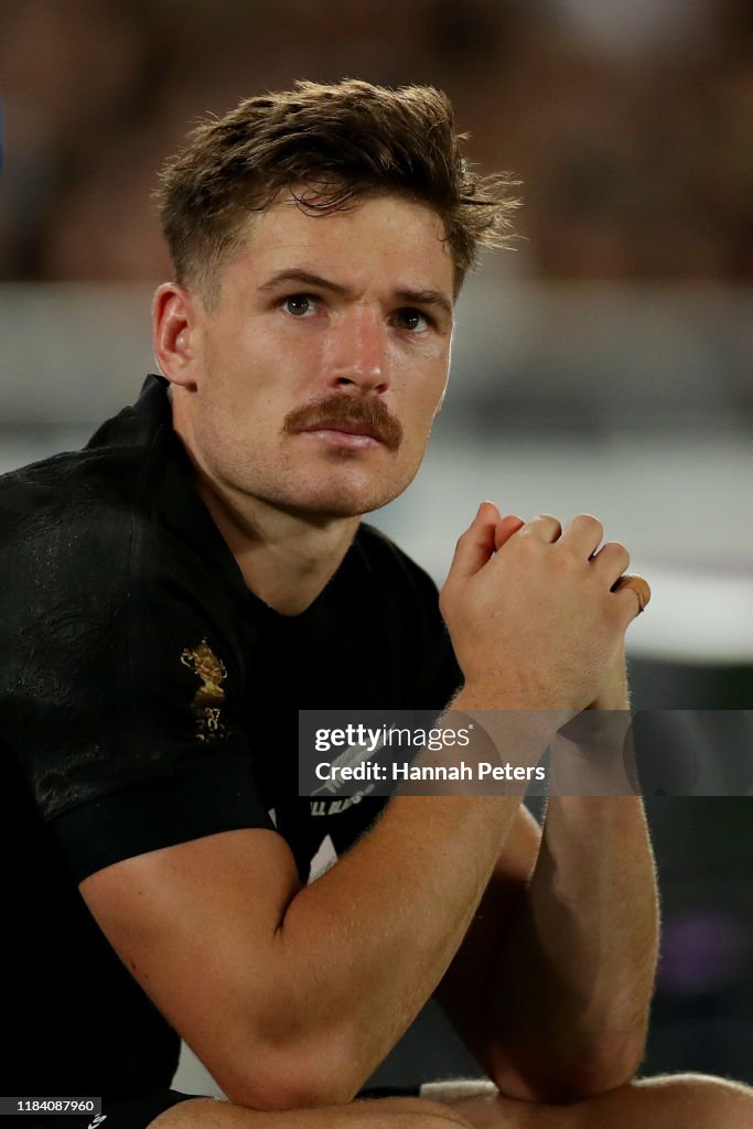 George Bridge of the All Blacks looks on from the bench during the ...