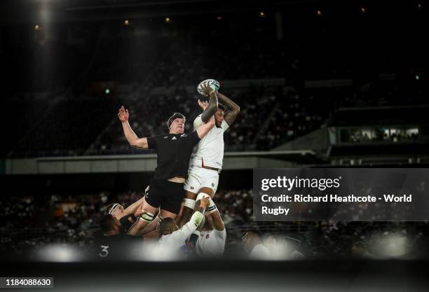 Courtney Lawes of England wins a lineout over Scott Barrett of New Zealand during the Rugby World Cup 2019 Semi-Final match between England and New...