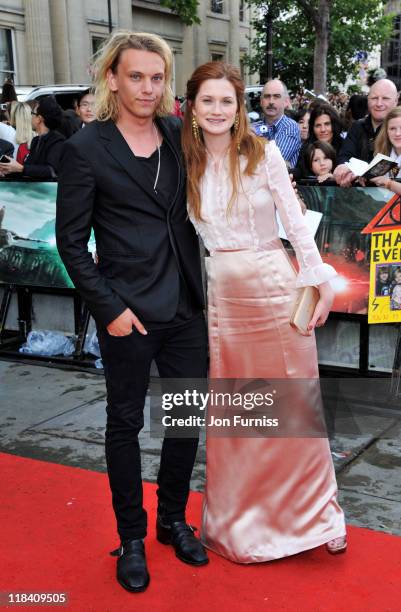 Jamie Campbell Bower and Bonnie Wright attend the "Harry Potter And The Deathly Hallows Part 2" world premiere at Trafalgar Square on July 7, 2011 in...