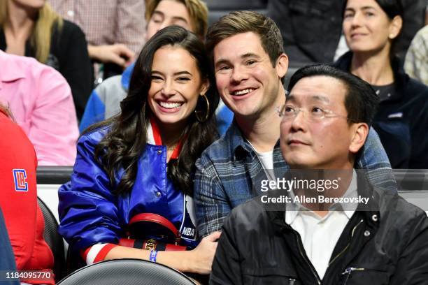 Chloe Bridges and Adam DeVine attend a basketball game between the Los Angeles Clippers and the Charlotte Hornets at Staples Center on October 28,...