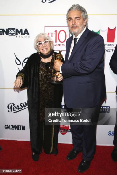 Lina Wertmuller and Paolo Rossi Pisu attend the Lina Wertmuller "True Italian Taste" Gala Reception Dinner Co-Hosted By The Italy-America Chamber Of...