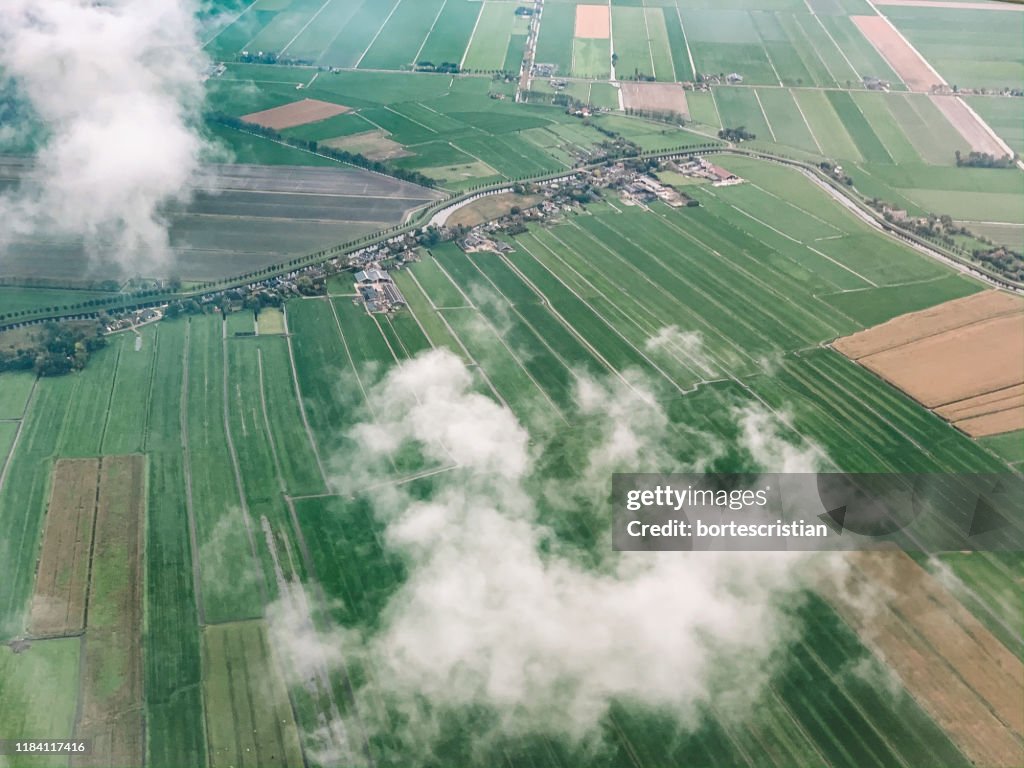 High Angle View Of River Amidst Agricultural Landscape