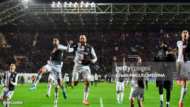 Juventus' Welsh midfielder Aaron Ramsey, Juventus' German midfielder Emre Can, Juventus' Argentinian forward Gonzalo Higuain, Juventus' Argentine...