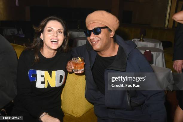 Caroline Barclay and Doc Gyneco attend Jean Marie Bigard « Ogre » Perfume Launch Party at Manko Club on October 28, 2019 in Paris, France.