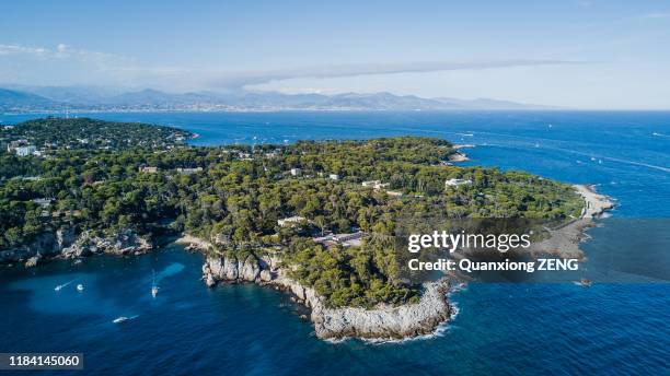 aerial view of cap d'antibes in cote d'azur in south france - antibes stock pictures, royalty-free photos & images