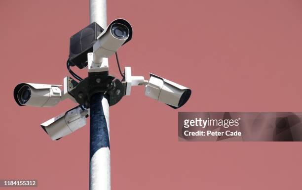 surveillance camera - security camera stock pictures, royalty-free photos & images