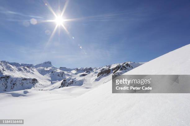 snowy scene in the alps - zonnig stockfoto's en -beelden