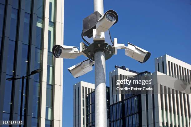 surveillance camera in london - outdoor security system stock pictures, royalty-free photos & images