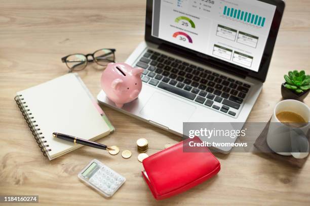 financial planning table top objects still life. - cuenta de banco fotografías e imágenes de stock