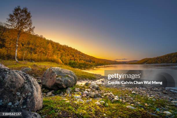 autumn landscape in lapland - riverbed ストックフォトと画像