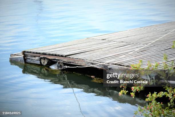 empty wooden pier on danube river - beautiful blue danube stock pictures, royalty-free photos & images