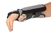 Held out human arm with wrist brace