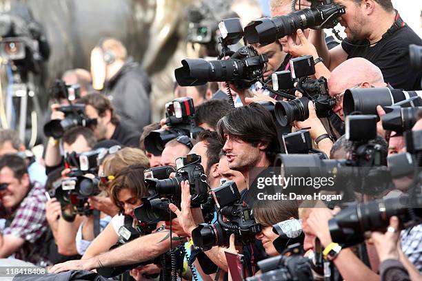 Photographers at the world premiere of Harry Potter and the Deathly Hallows Part 2 at Trafalgar Square on July 7, 2011 in London, England.