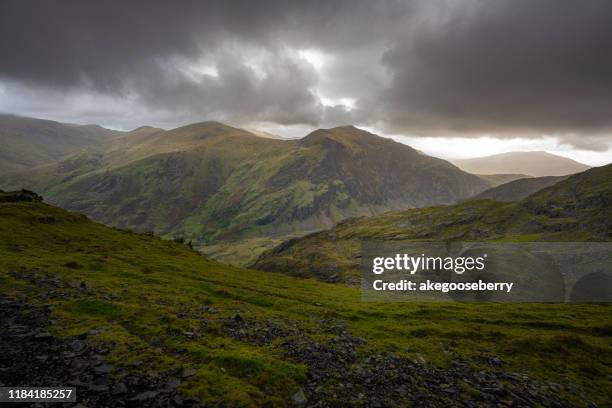 snowdonia is a mountainous region in northwestern wales - welsh hills stock pictures, royalty-free photos & images