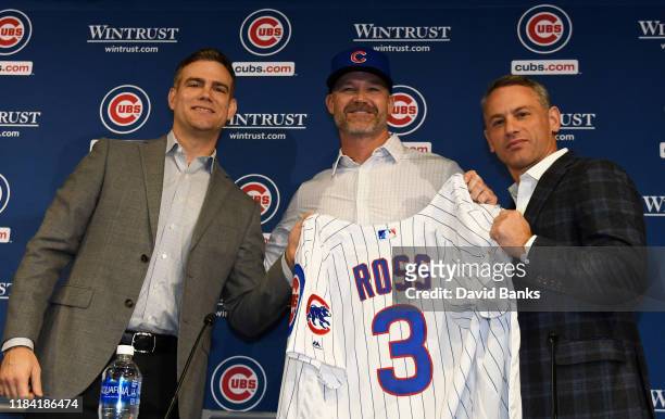 Theo Epstein, president of baseball operations of the Chicago Cubs, David Ross, new manager of the Chicago Cubs and Jed Hoyer, general manager of the...