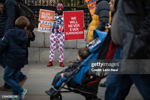 Pro-Brexit activist Joseph Afrane protests outside the Houses of Parliament on October 29, 2019 in London, England. Prime Minister Boris Johnson has...