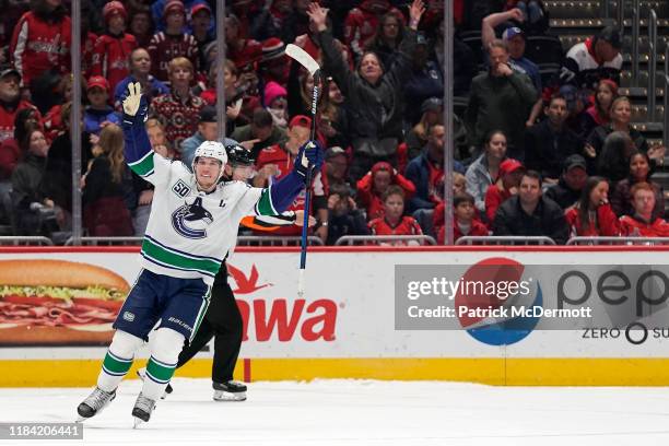 Bo Horvat of the Vancouver Canucks celebrates after scoring the game winning goal in a shootout against the Washington Capitals at Capital One Arena...