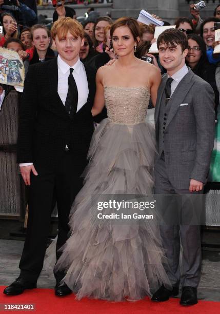 Rupert Grint, Emma Watson and Daniel Radcliffe attend the World Premiere of Harry Potter and The Deathly Hallows - Part 2 at Trafalgar Square on July...