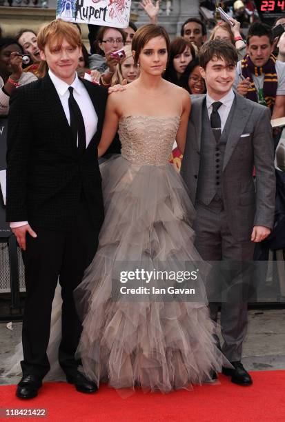 Rupert Grint, Emma Watson and Daniel Radcliffe attend the World Premiere of Harry Potter and The Deathly Hallows - Part 2 at Trafalgar Square on July...