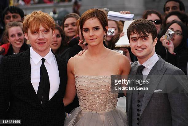 Rupert Grint, Emma Watson and Daniel Radcliffe attend the World Premiere of Harry Potter and The Deathly Hallows - Part 2 at Trafalgar Square on July...