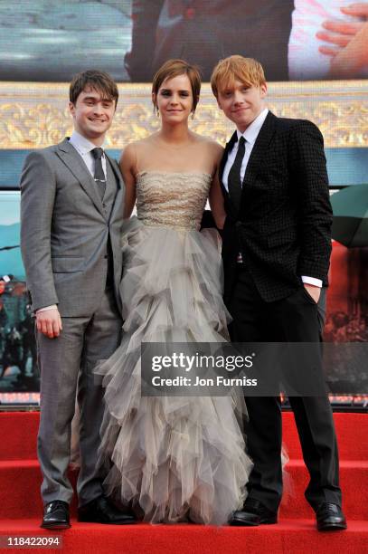 Actor Daniel Radcliffe, actress Emma Watson and actor Rupert Grint attend the "Harry Potter And The Deathly Hallows Part 2" world premiere at...