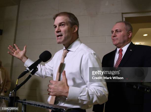 Rep. Jim Jordan and House Republican Whip Steve Scalise speak to the media outside of a closed-door deposition on Capitol Hill, October 29, 2019 in...
