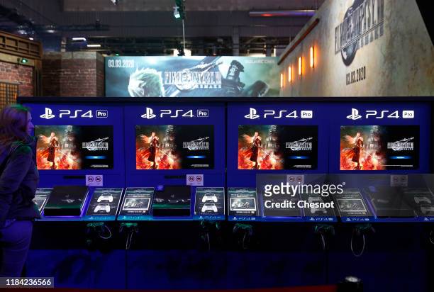 Sony PlayStation game consoles PS4 Pro with the logo of the video game 'Final Fantasy VII Remake' developed and published by Square Enix are...