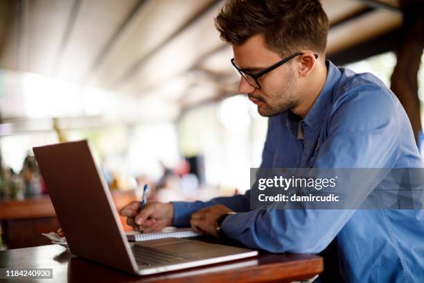 Man Writing Computer Man Writing At Computer Photos and Premium High Res Pictures - Getty Images