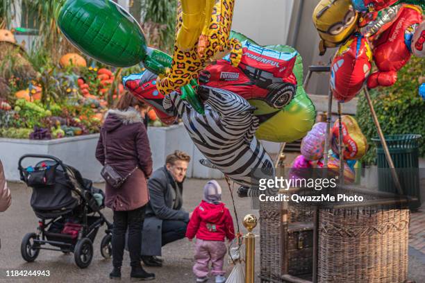 family by the balloon basket - tivoli stock pictures, royalty-free photos & images
