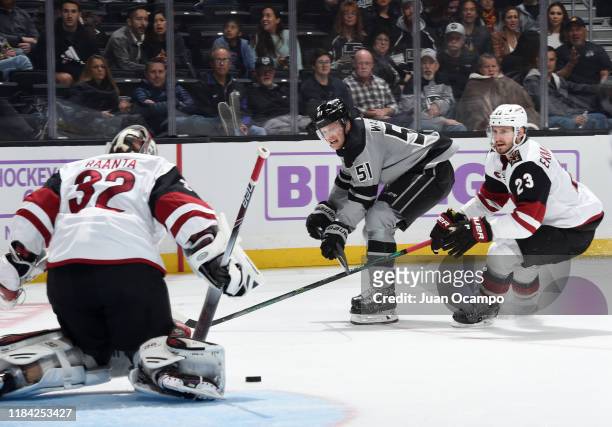 Goaltender Antti Raanta of the Arizona Coyotes makes a save on shot by Austin Wagner of the Los Angeles Kings as Oliver Ekman-Larsson of the Arizona...