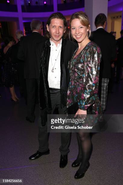 Julian Plica and Dr. Monika Gratzke during the PIN Party at Pinakothek der Moderne on November 23, 2019 in Munich, Germany.