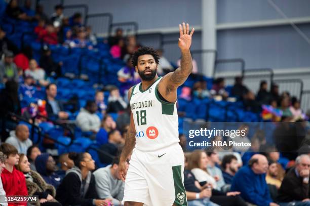 Trevor Lacey of the Wisconsin Herd makes a hand signal to a teammate as they take on the Delaware Blue Coats during an NBA G League game on November...