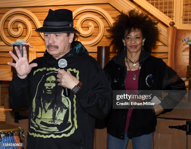 Recording artists Carlos Santana and his wife Cindy Blackman Santana participate in the Las Vegas Philharmonic's global edition of the orKIDStra...