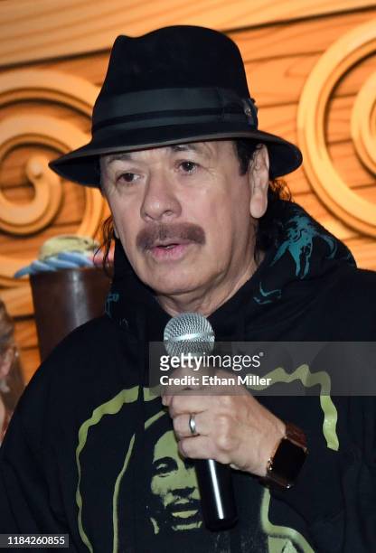 Recording artist Carlos Santana participates in the Las Vegas Philharmonic's global edition of the orKIDStra music education program for a group of...