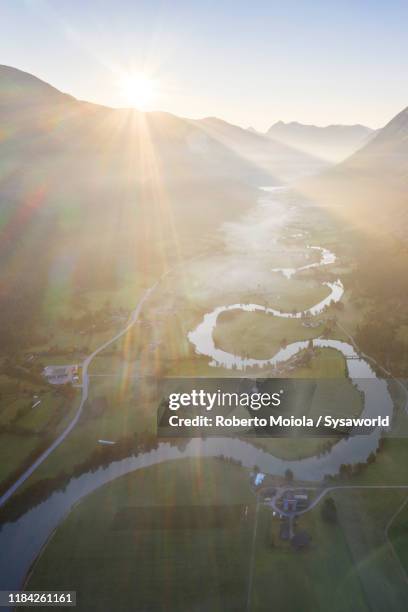 misty on stryneelva river, aerial view, stryn, norway - olden foto e immagini stock