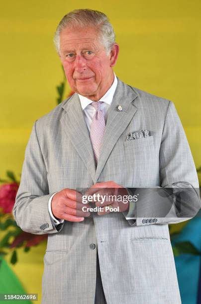 Prince Charles, Prince of Wales undertakes a series of Investitures during a ceremony at the Recreational Leaf Hut at Government House in Honiara,...