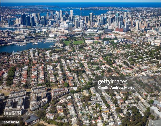 sydney city skyline with inner suburb of glebe, australia, aerial photography - centrepoint tower stockfoto's en -beelden