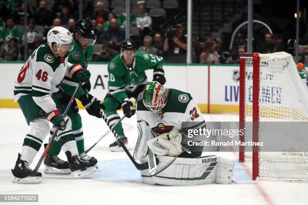 Alex Stalock of the Minnesota Wild makes a save against the Dallas Stars in the first period at American Airlines Center on October 29, 2019 in...